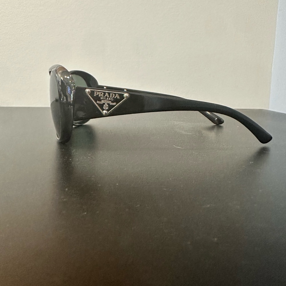 Black Prada sunglasses.